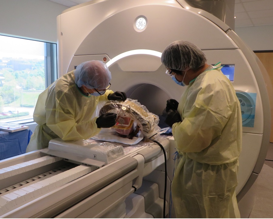 Image: A recent trial showcased AiM`s robot in a fully direct MRI-guided procedure for bilateral deep brain stimulation lead placement in a human cadaver (Photo courtesy of AiM)